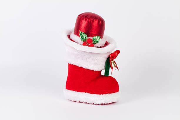 istock Santa's hat on xmas boot. Isolated on a white background 495267378