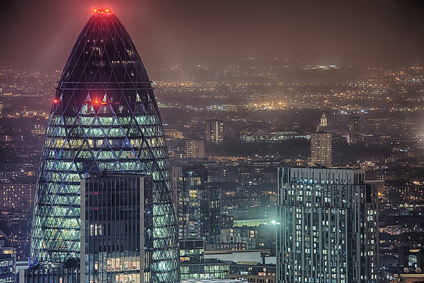 London Skyline at Night A view South at a detail in the London night skyline. gherkin london night stock pictures, royalty-free photos & images