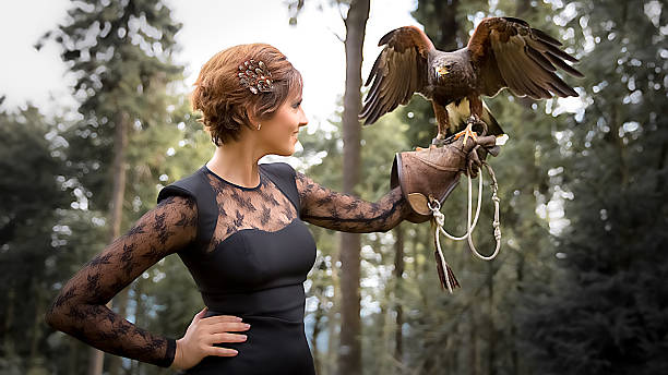 istock The Lady with the harris hawk 495268474