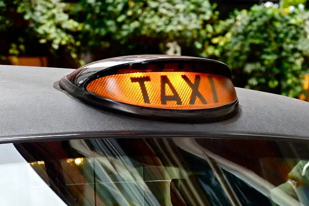 Close-up black cab in London