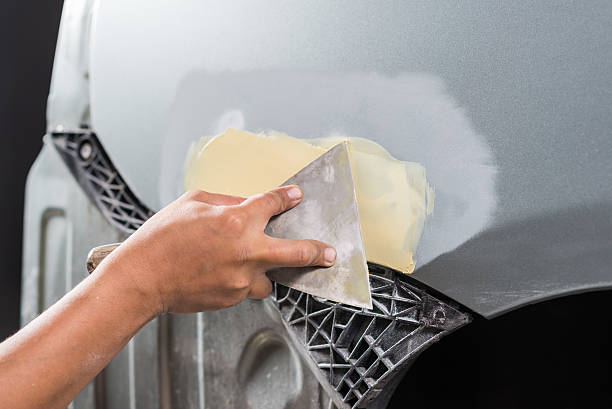 istock Car paint repair series : Working on putty 495269648