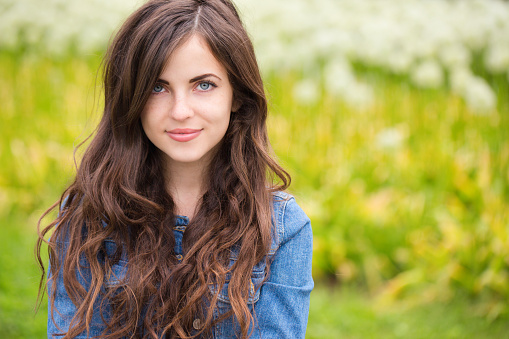 Portrait of a beautiful young woman outdoor