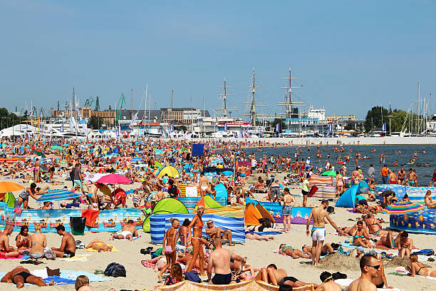 Gdynia, Poland - August 2, 2015: Crowded public beach in Gdynia on Baltic sea