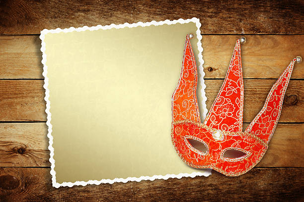 istock Carnival red mask with old paper for greeting on background 495273865