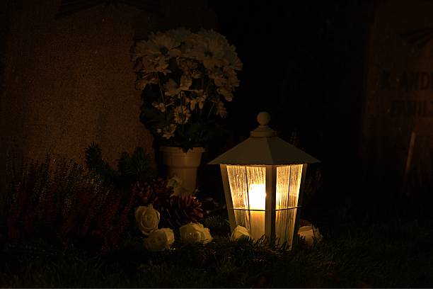 istock Cenotaph Oil Candle at tombstone 495274066