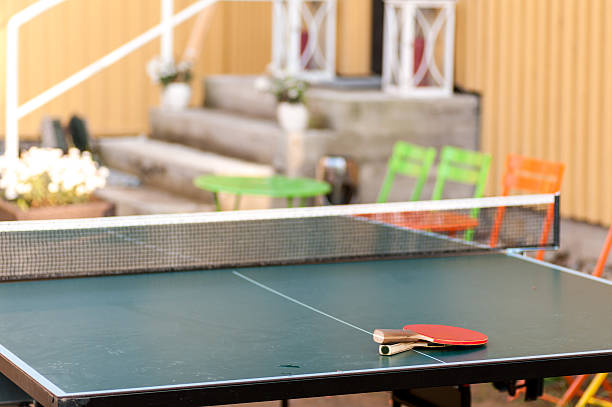 istock two rackets on the table in recreation area 495275795