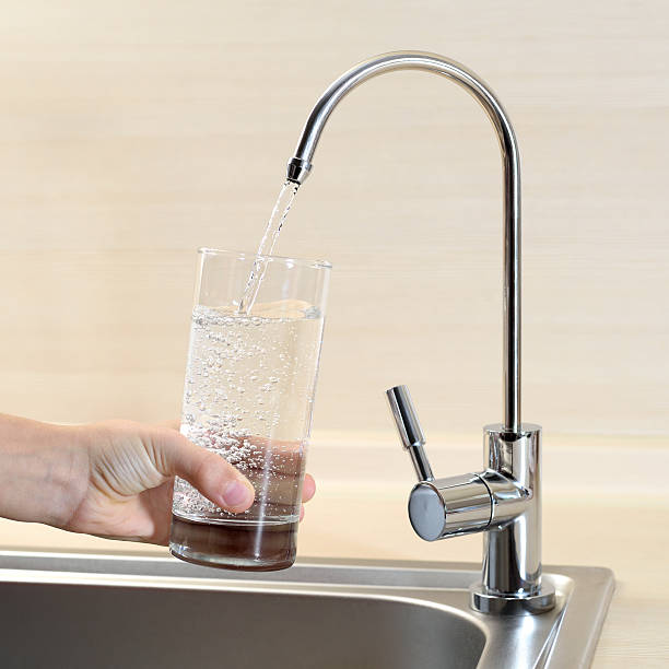 istock Filling glass of water 495276539