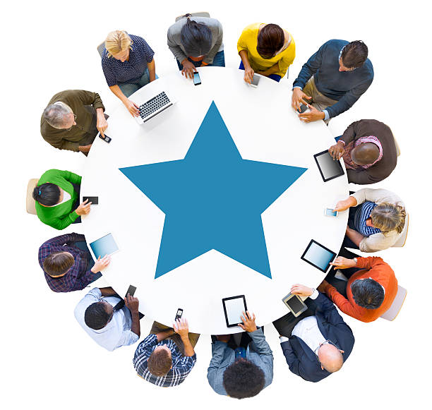Multiethnic People Social Networking Around Conference Table