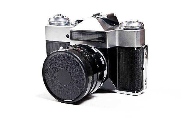 istock Old range finder vintage photo camera on white background. 495287524