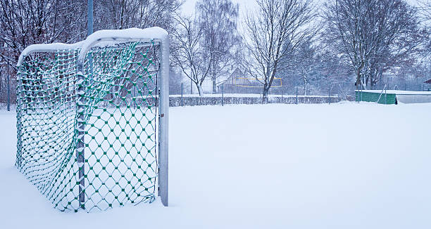 Empty Soccer Goal in Snow stock photo