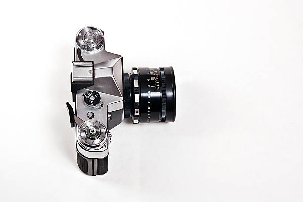 istock Old range finder vintage photo camera on white background. 495287556