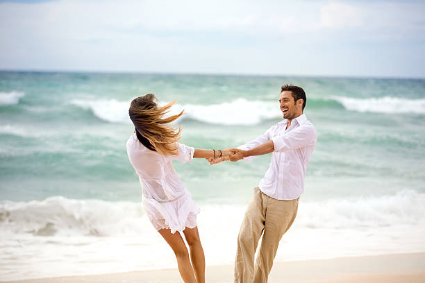 istock Love couple having g fun on beach 495288424