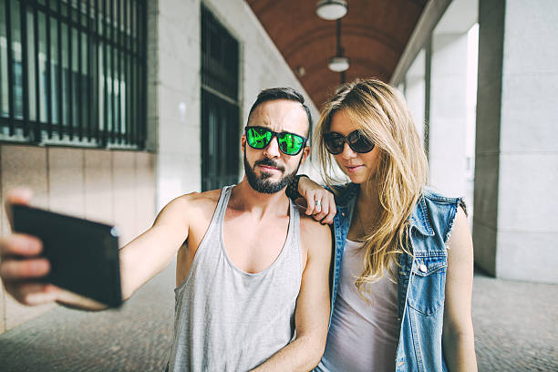 istock Young skaters posing and taking a selfie with mobile 495289094