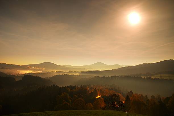 istock Ful moon night. Fog move between hills and peaks 495289686