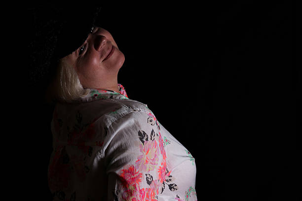 istock Woman Leans Back to Pose For Camera 495289688