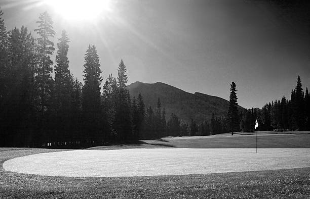 istock Black and White Image of Beautiful Golf Green in Mountains 495291506