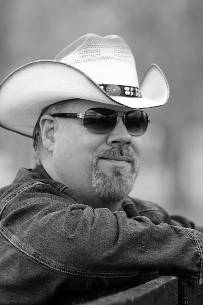 istock Black & White Image of Cowboy Posing For Camera 495292448