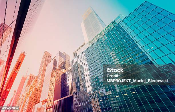 Vintage Toned Manhattan Skyscrapers At Sunset Nyc Usa Stock Photo - Download Image Now