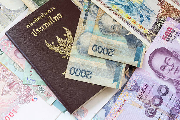 istock Thailand passport and money 495294200