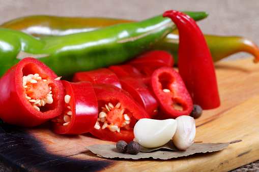 a hot peppers , beautiful background spices and condiments close up