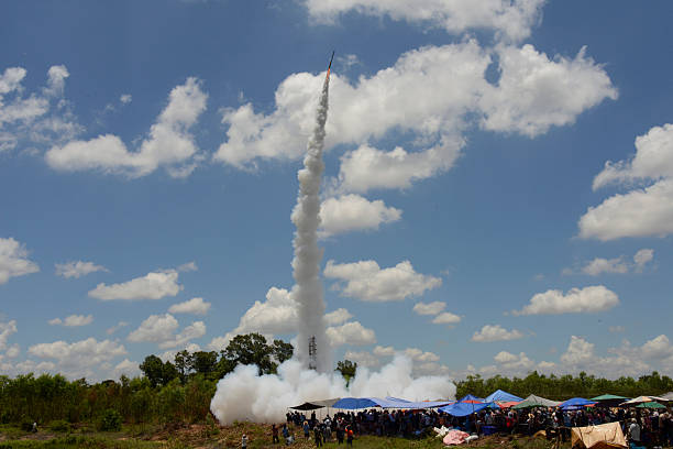 A rackete starts at the traditional rocket festival or Bun Bang Fai or Rocket Festival in Ban Si Than in the province of Amnat Charoen northwest of Ubon Ratchathani in northeastern Thailand in South-East Asia.