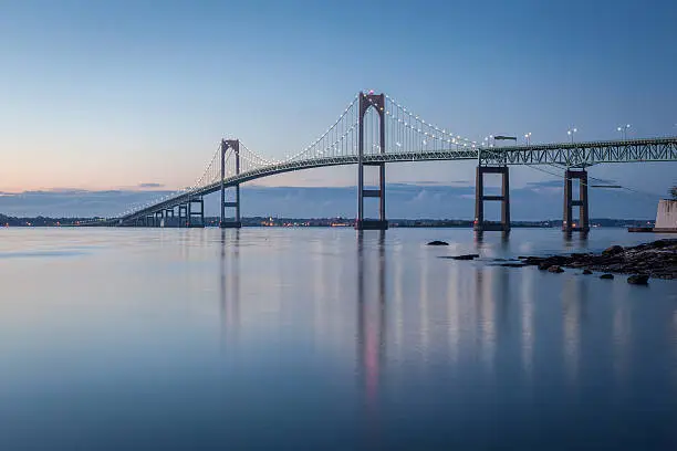 This is a long exposure morning  image of the Newport Bridge from Taylor Point near Jamestown, Rhode Island, USA.
