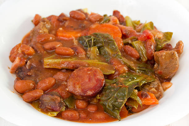 istock smoked sausages with carrot, beans and cabbage 495306147