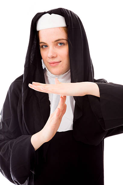 istock Young nun making time out signal with hands 495306441