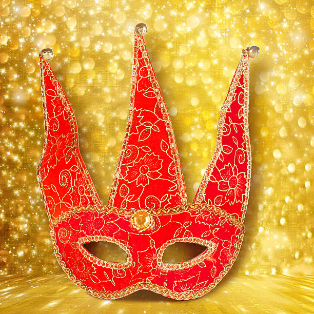 istock Carnival red mask on gold abstract background with bokeh effect 495307645