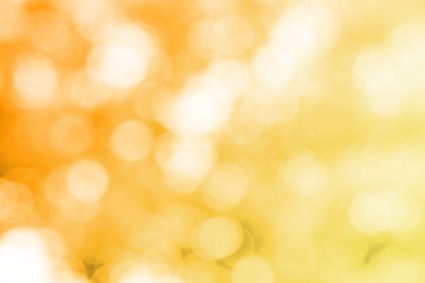 istock Gold glitter sparkle defocused rays lights bokeh 495316126
