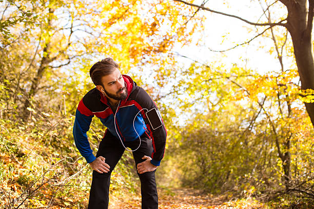 istock Tired exhausted man runner sweating after cardio workout 495316754