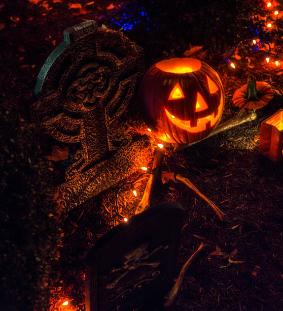 istock Halloween Tombstone Cemetery Jack O'Lantern Pumpkin 495317002