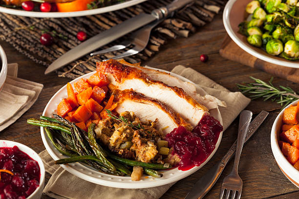istock Full Homemade Thanksgiving Dinner 495329952