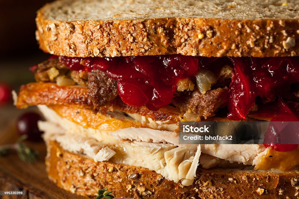 Homemade Leftover Thanksgiving Sandwich Homemade Leftover Thanksgiving Sandwich with Turkey Cranberries and Stuffing Sandwich Stock Photo