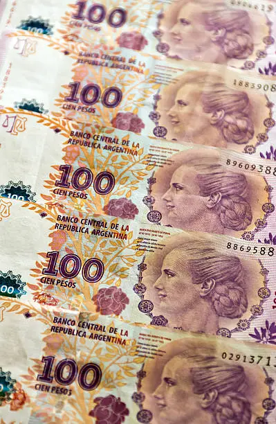 Argentinian banknotes with the image of Eva Peron, (Evita). Selective focus.