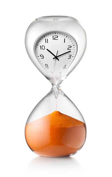 istock The passage of time. Hourglass with clock. 495332744