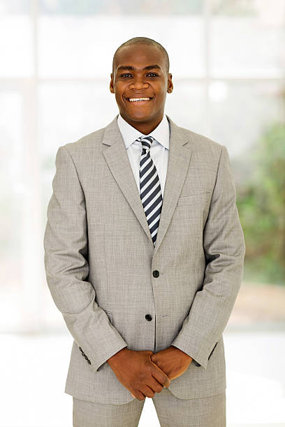 istock young african american businessman standing in office 495332848