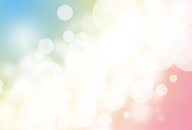 istock Colorful glitter sparkle defocused rays lights bokeh 495333312