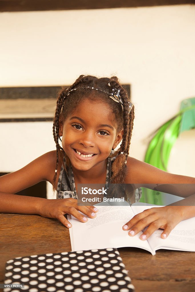 Brazilian Girl Learning Book Stock Photo