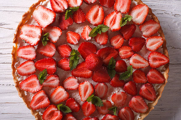 istock delicious strawberry tart closeup on the table. horizontal top v 495334682