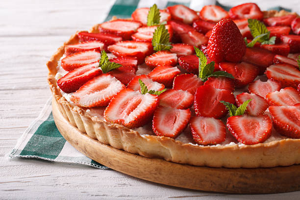 istock strawberry tart with cream cheese and mint closeup. Horizontal 495334984