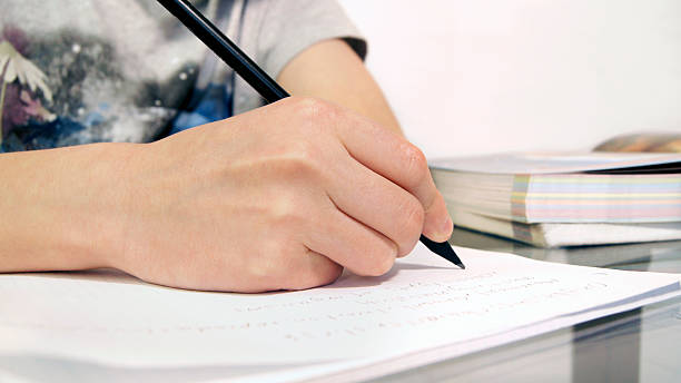 istock Teenager Essay Writing 495335441