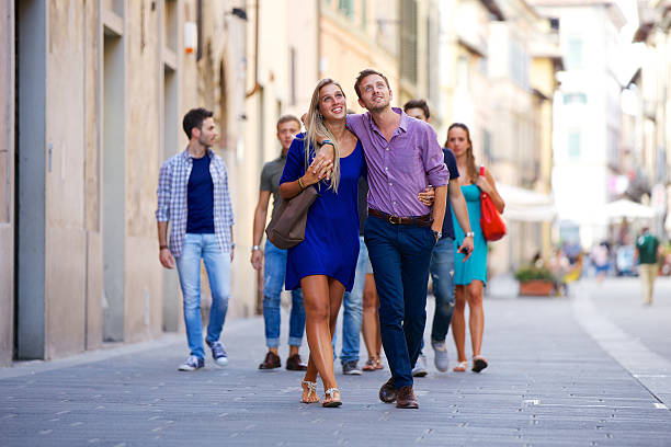 istock Friends walking in the city 495337837