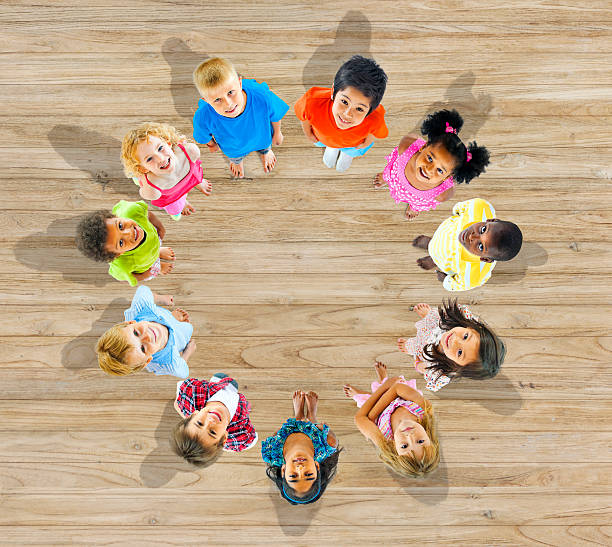 istock Group of Multiethnic Children Looking Up 495337925