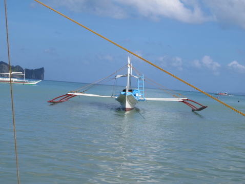 Philippine boat with stabilizers for sailing