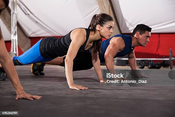 Focused On Her Push Ups Stock Photo - Download Image Now - Active Lifestyle, Adult, Adults Only