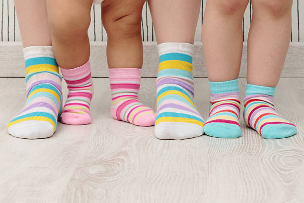 istock family in socks 495341201