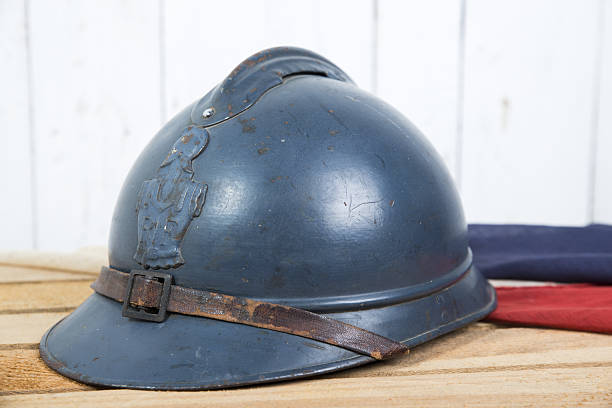 istock french helmet and old french flag 495341425