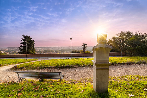 istock Statue and bench in the Gianicolo park at sunrise 495341678