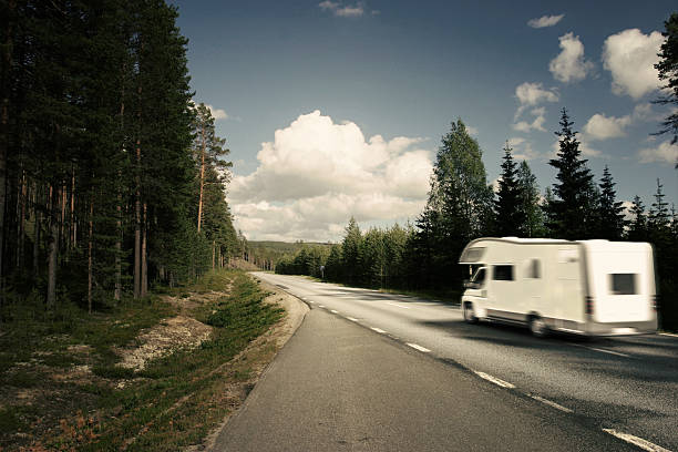 istock Caravan trailer home on the road 495342808